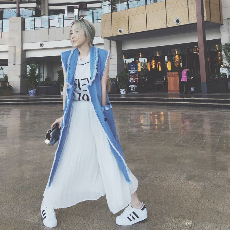 long denim sleeveless jacket
