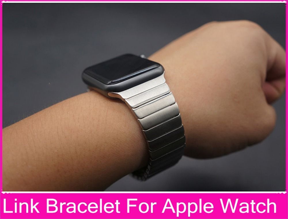 silver band on black apple watch