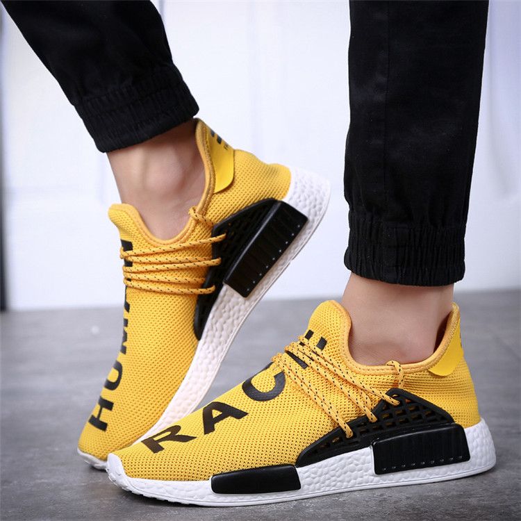 Human race on sale trainers yellow