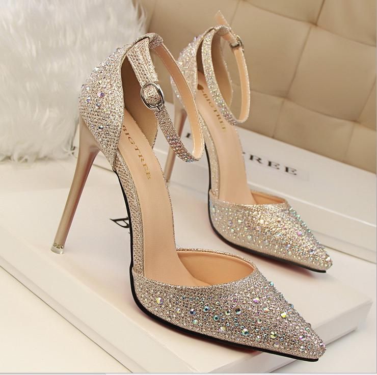 gold pointed heels with ankle strap