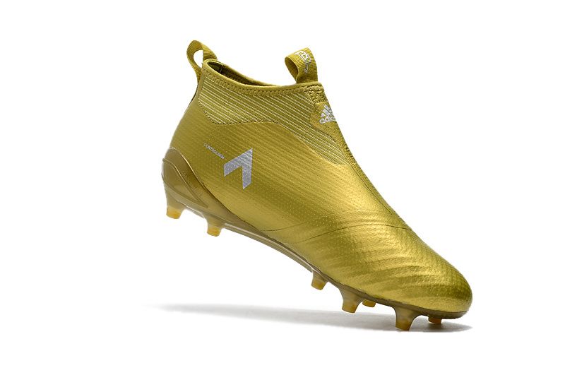 gold colour football boots
