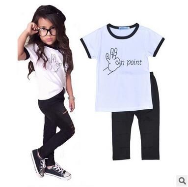 white shirt black pants girl