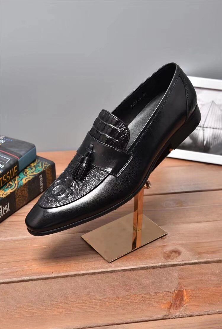 crocodile print loafers