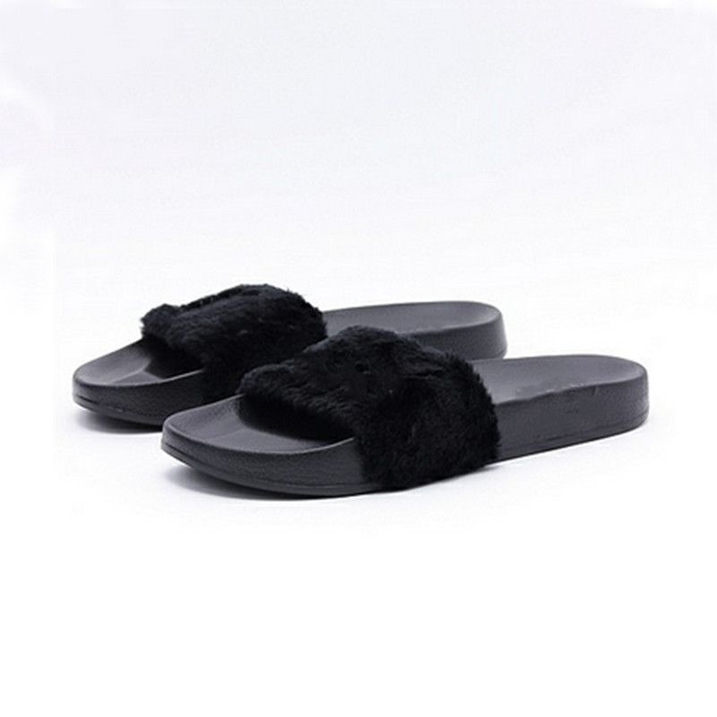 girls black flip flops
