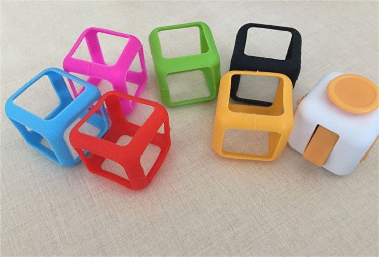 Divertente Ambiente Abs Fidget Cube Toy Protegge Caso Custodie Magic Cube Adulto Bambini Decompression Shelter Protezione