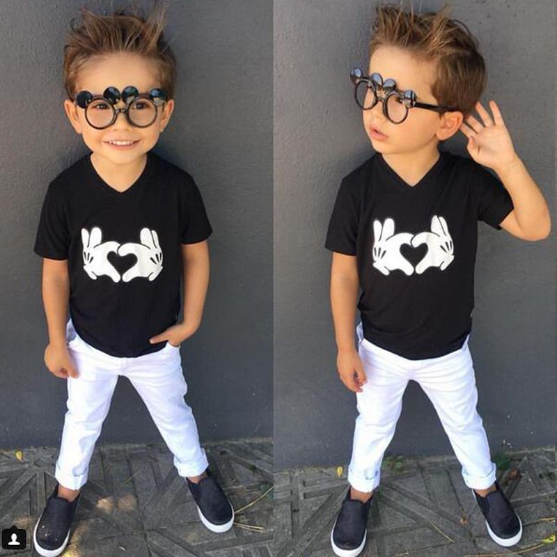 white pants black shirt outfit