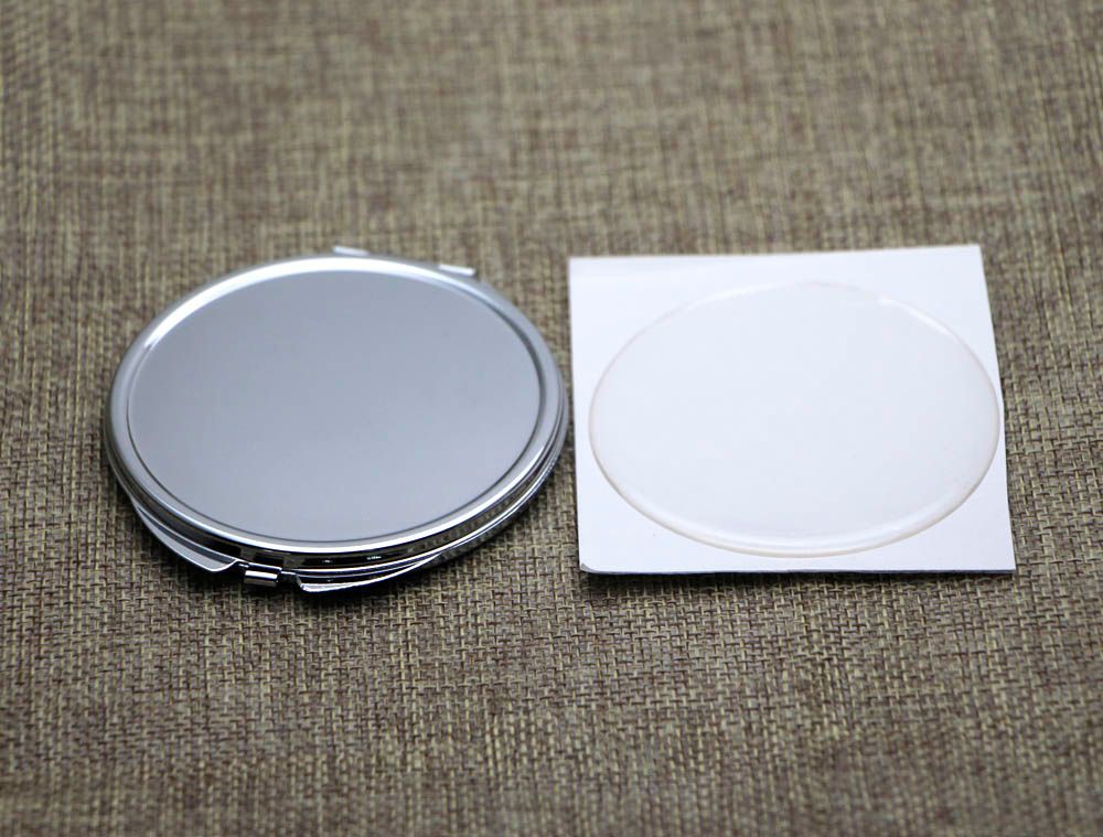Kompakt spegel med epoxi klistermärke