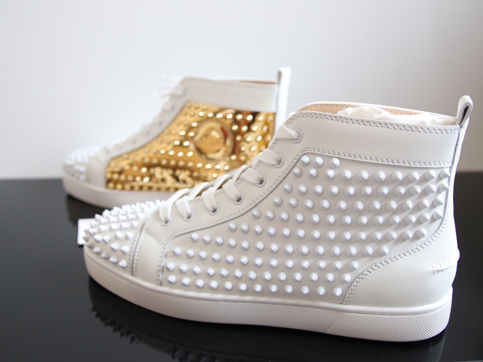 white and gold red bottom sneakers