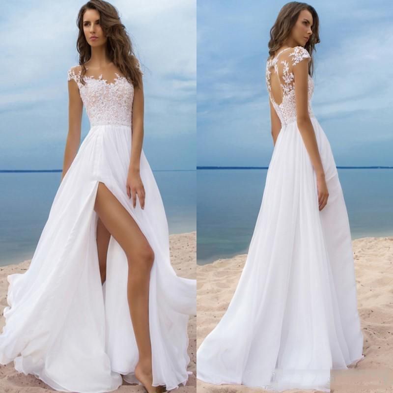 Discount Luxury Beach Boho Wedding Dresses Short Sleeves Cheap Chiffon Long Bridal Gowns High Side Slit Backless Robe De Mariee Sheer Neck Dresses