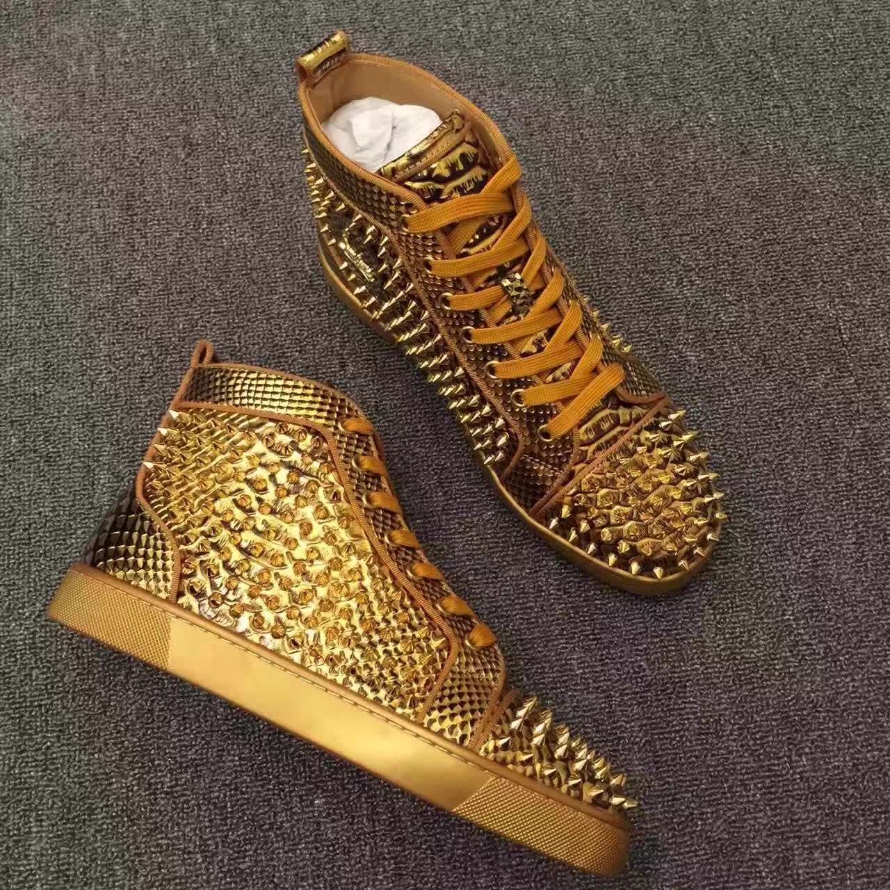 gold spike shoes