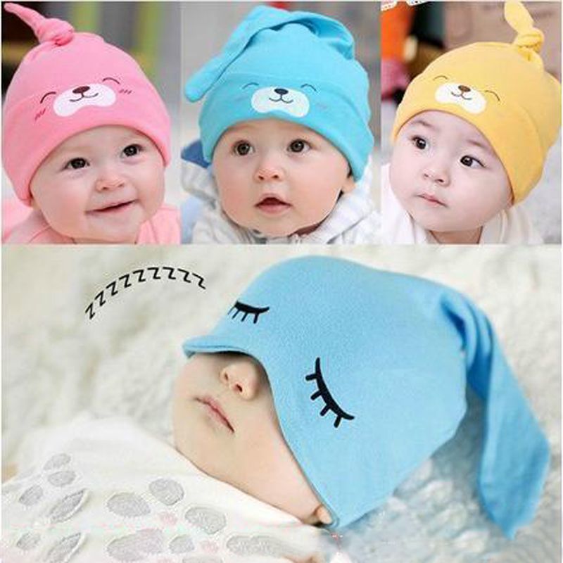 baby sleeping with hat on