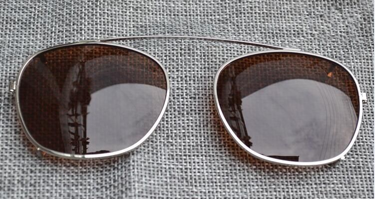 Silver frame brown lens