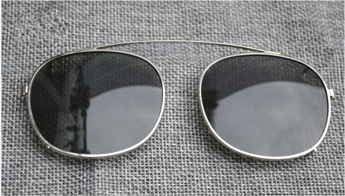 Zilveren frame groene lens