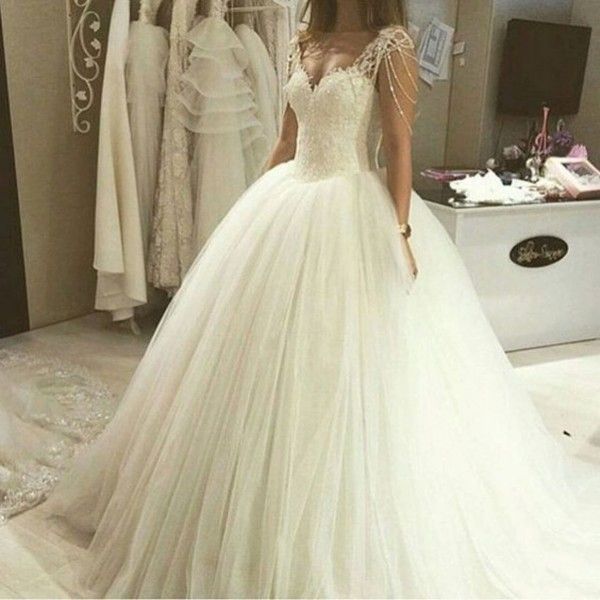 fit and flare ball gown wedding dress