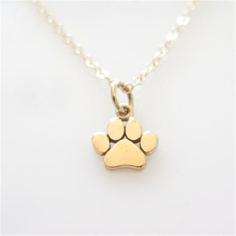 dog paw pendant gold