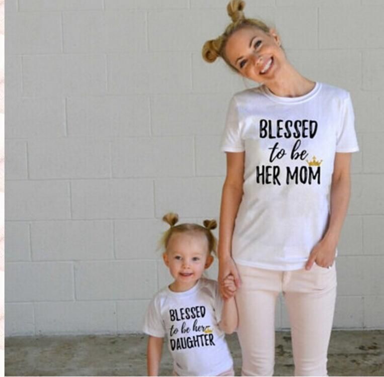 mother father and daughter matching outfits