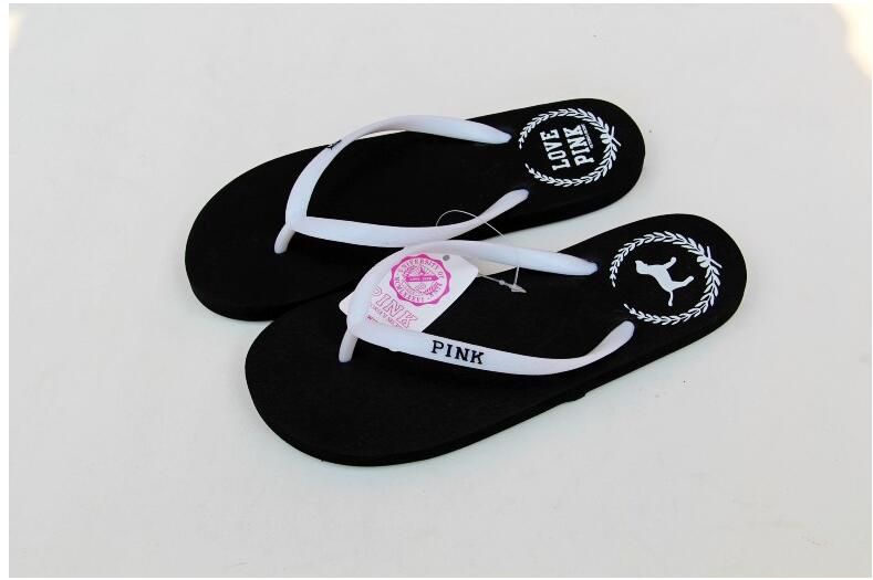 pink brand flip flops