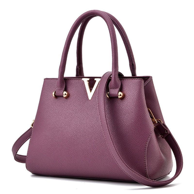 buying first designer bolsa