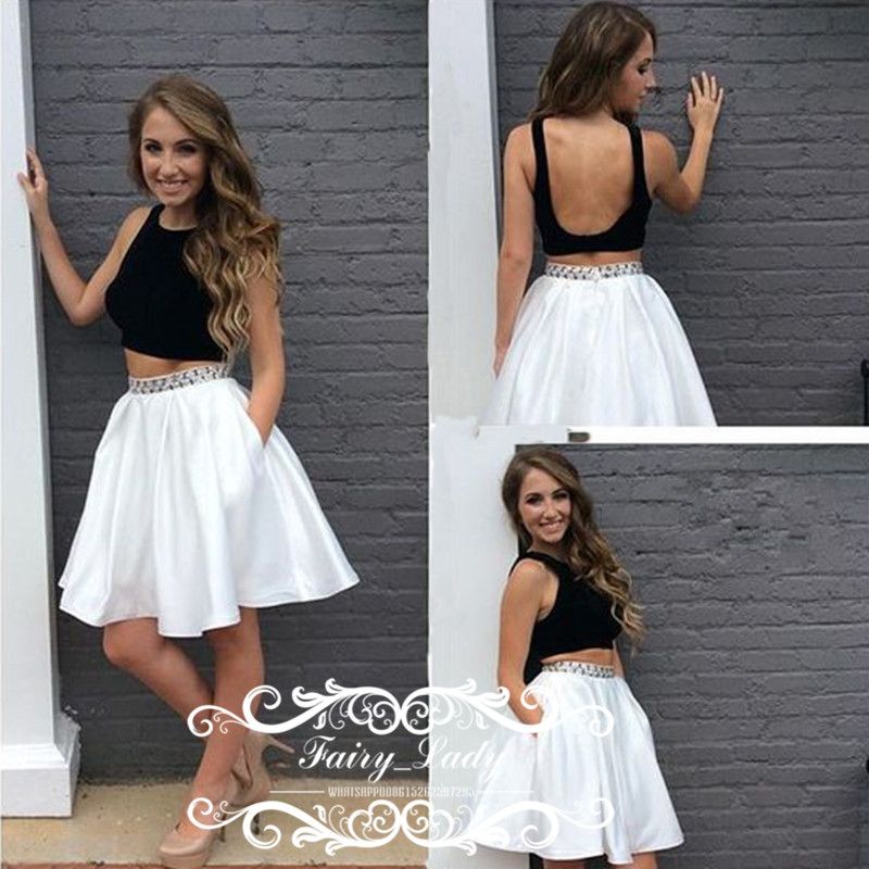 white top black skirt