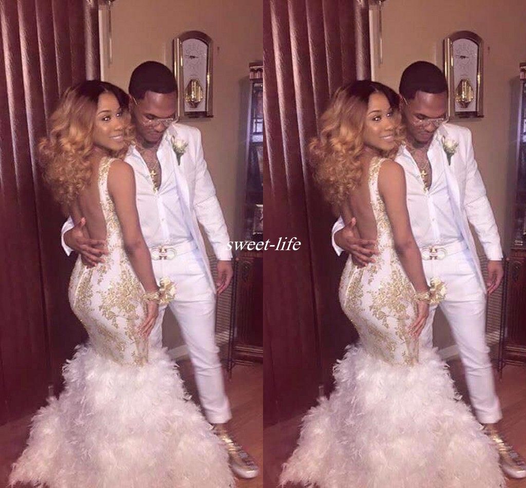 white prom dress with feathers