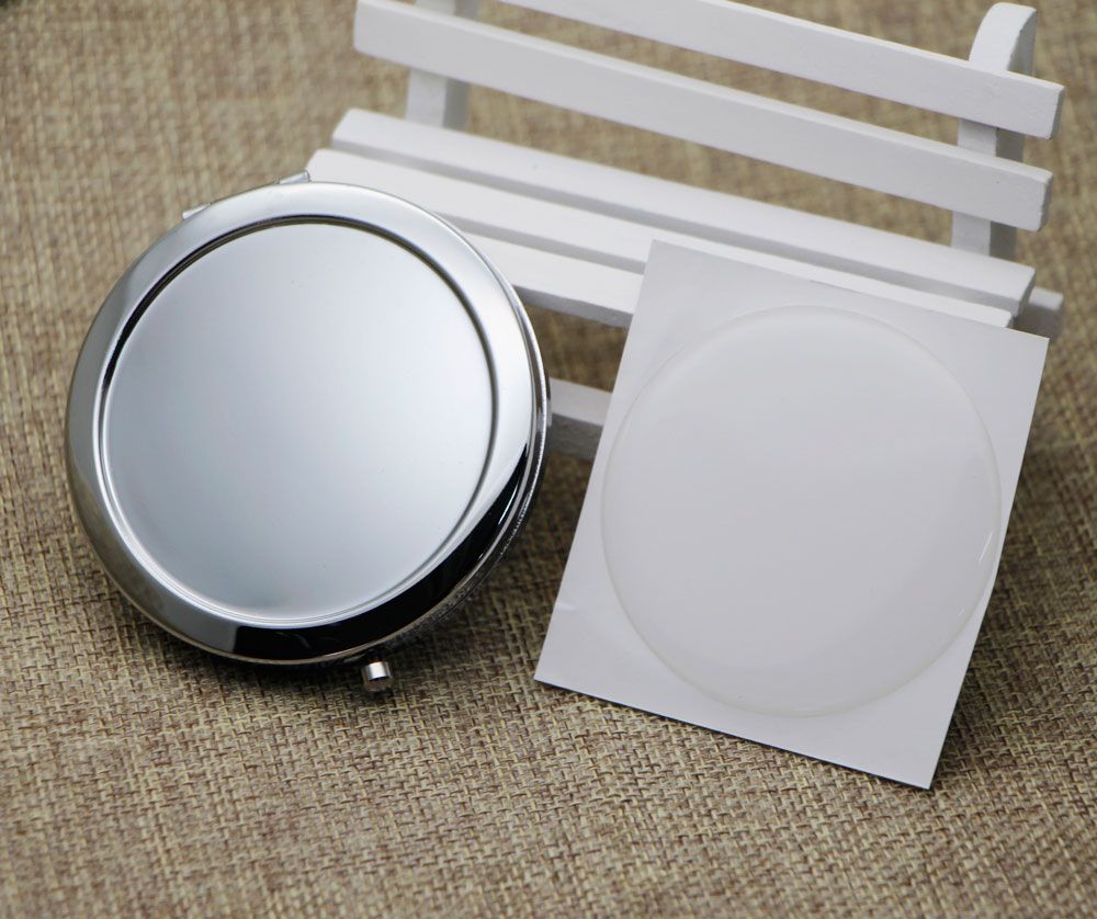 Kompakt spegel med epoxi klistermärke