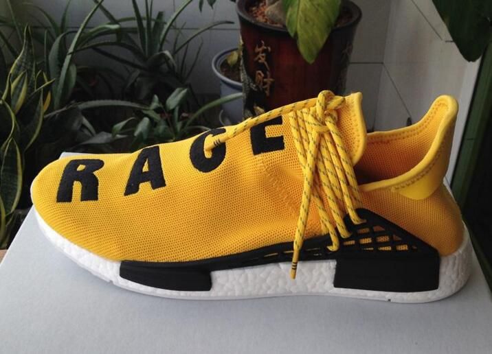 nmd human race yellow