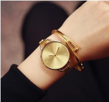 big dial golden watch