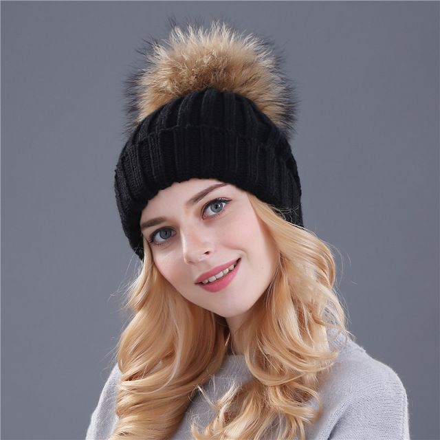 hat with fur ball on top