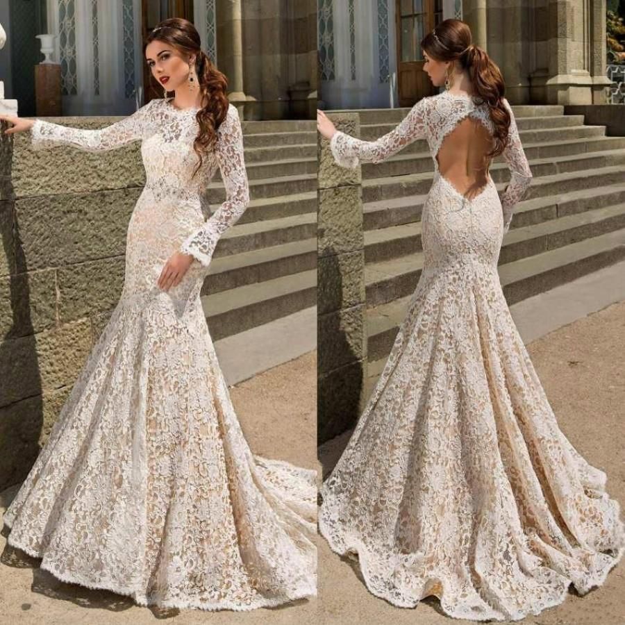 fitted lace wedding dress with open back
