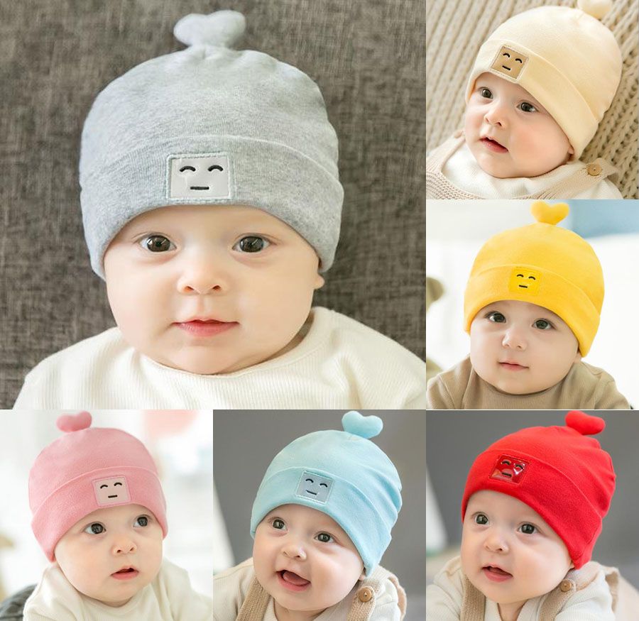babies in beanies