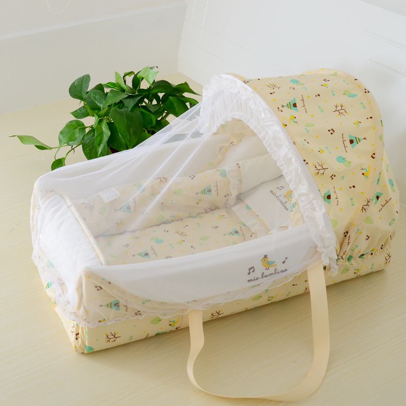 baby bassinet by bed