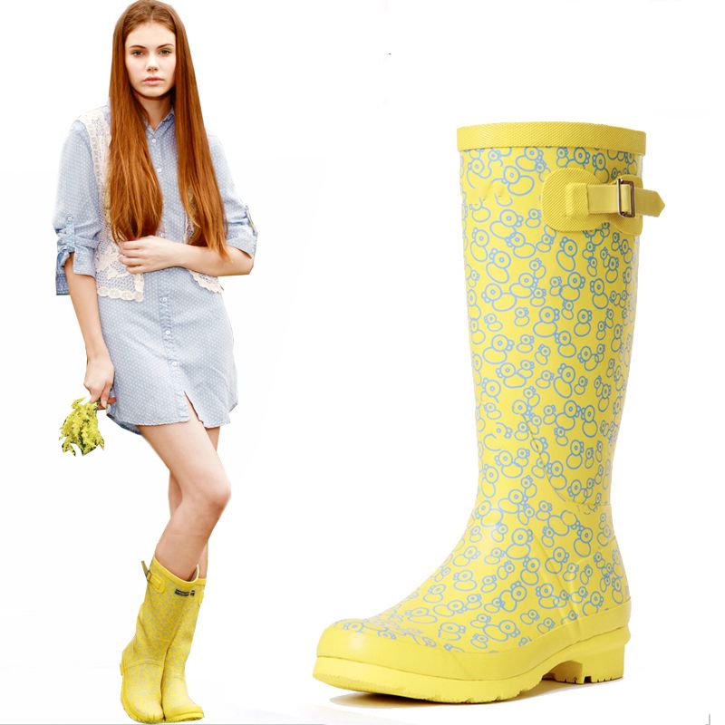 yellow rain boots in store