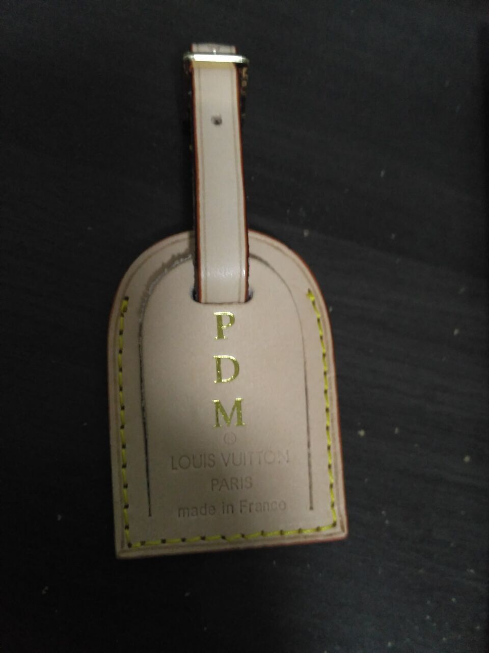 designer luggage tag