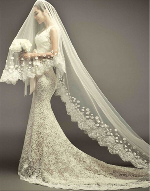wedding dresses with long trains and veils