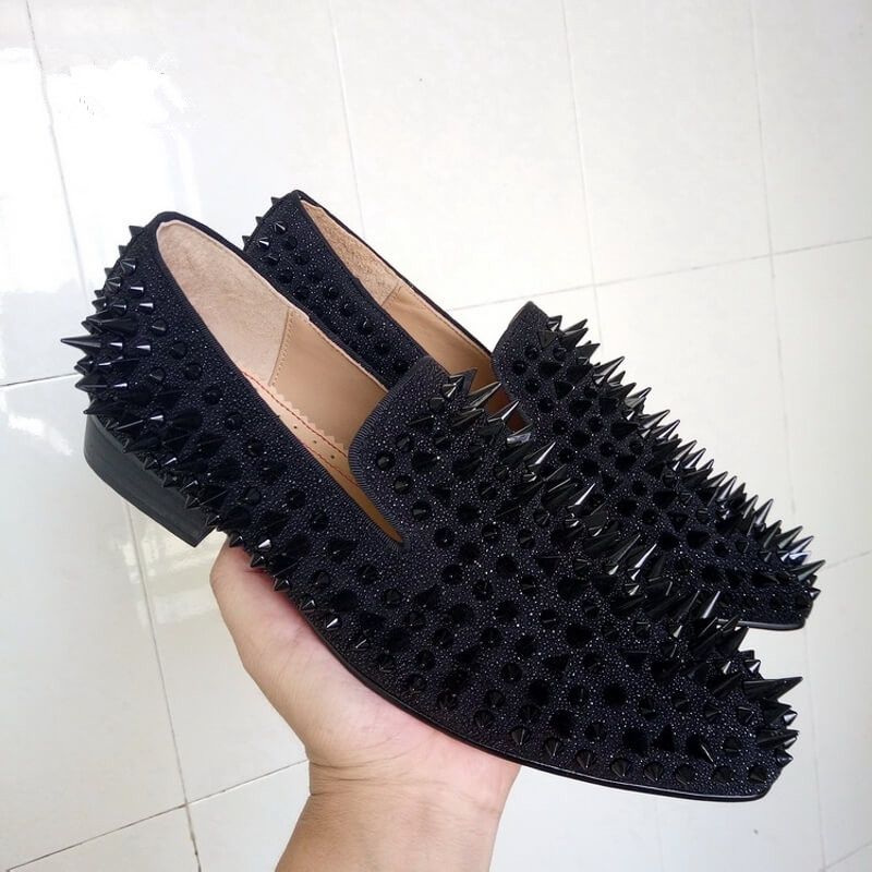 loafers with spikes on them