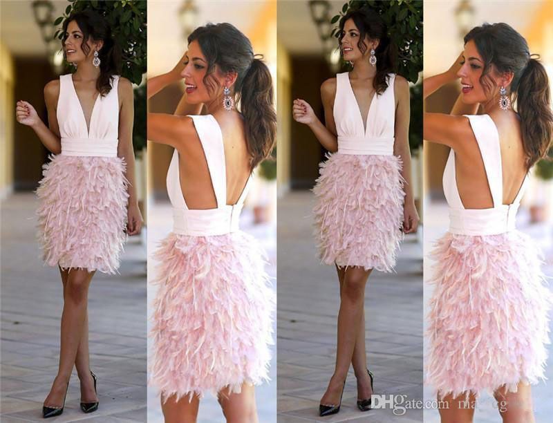 abiti eleganti con piume