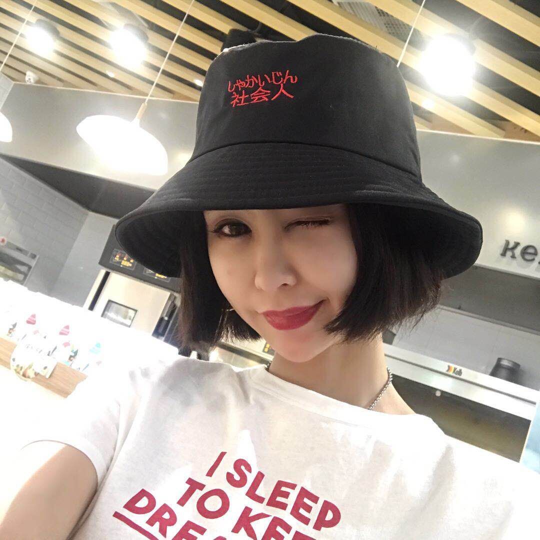 women in bucket hats