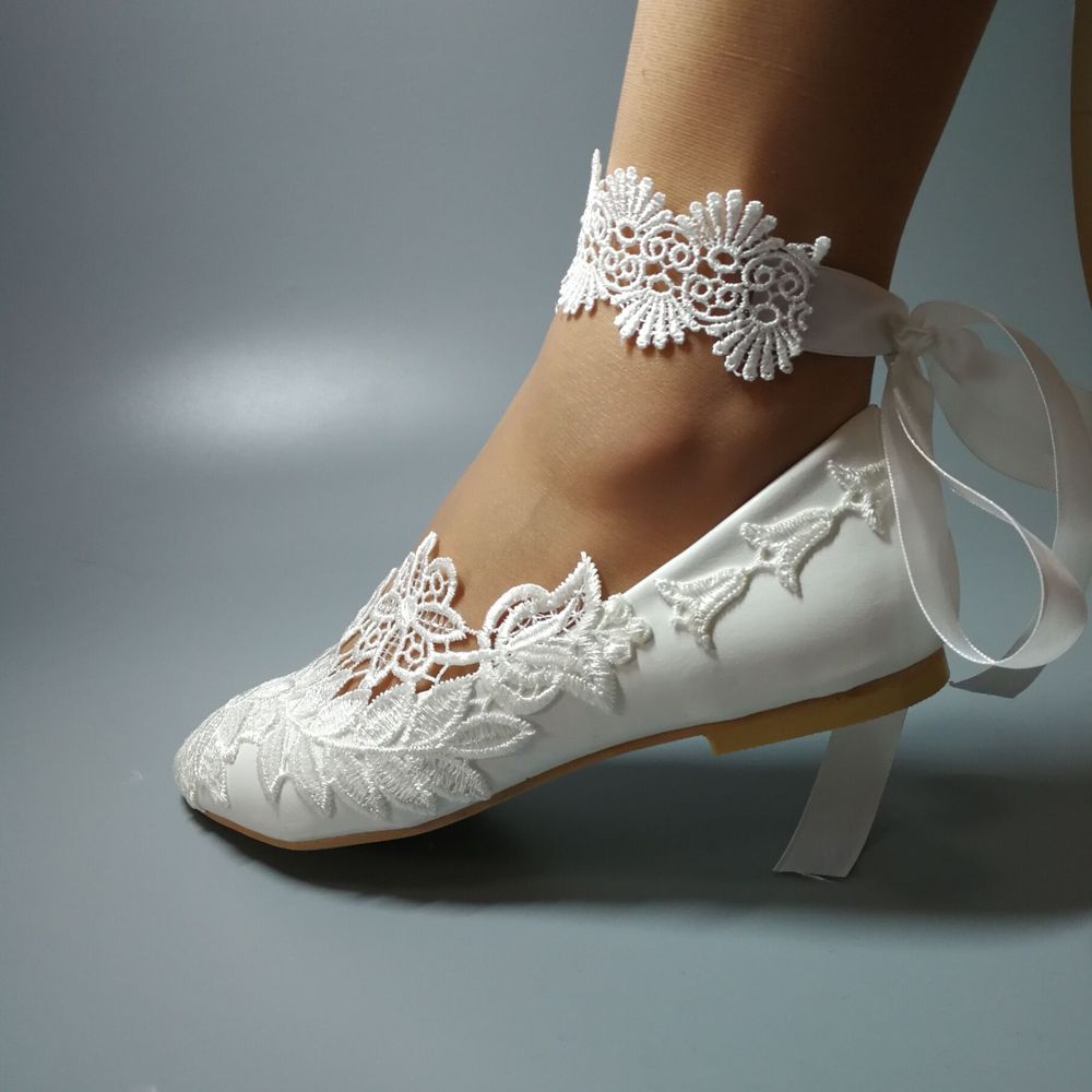 white ballet style shoes