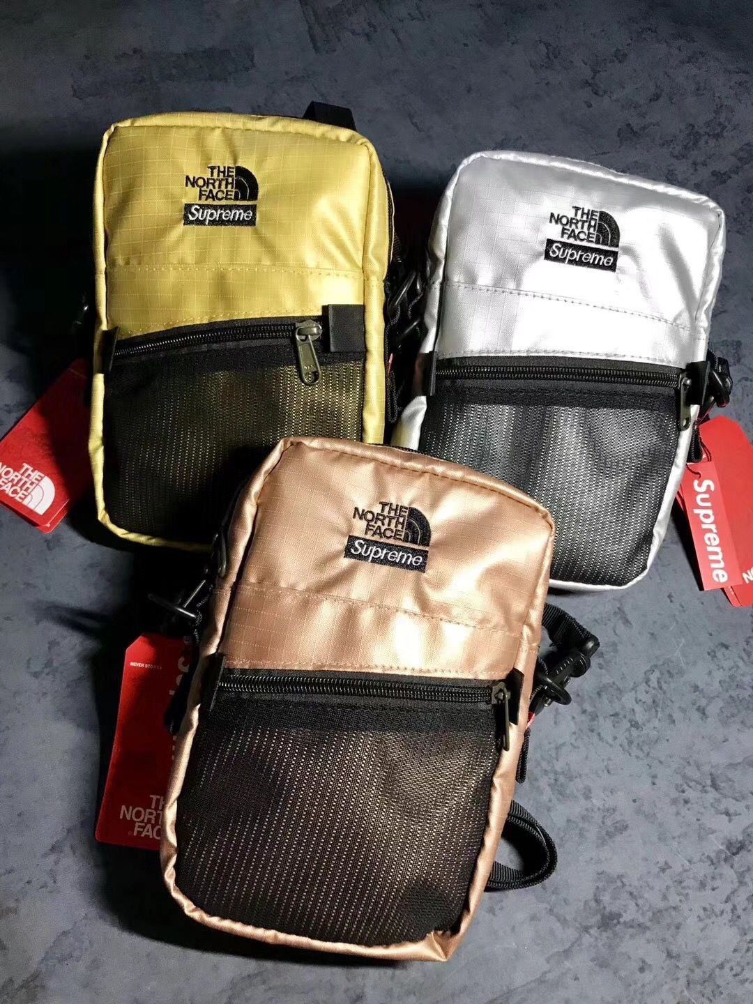 supreme north face tote bolsa