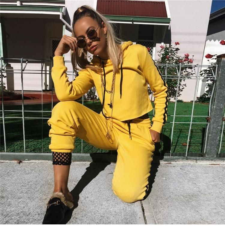 black and yellow jogging suit
