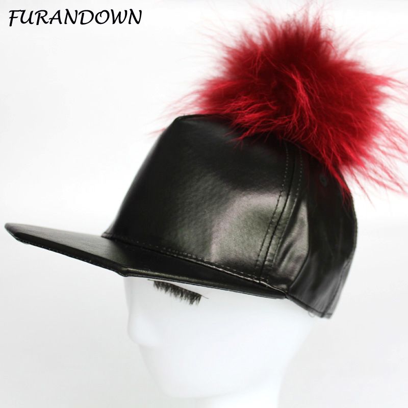 leather baseball cap with fur ball on top