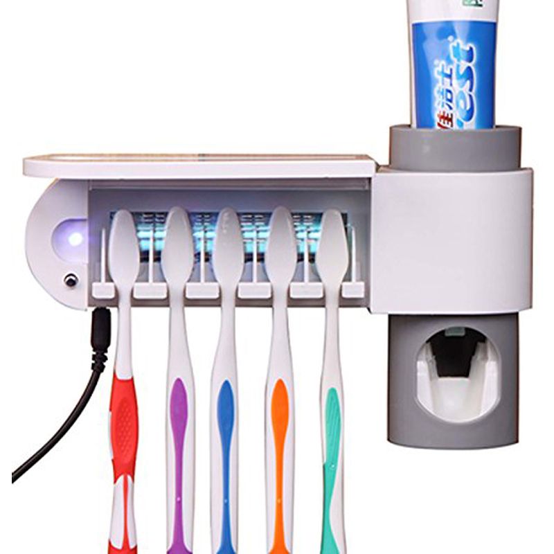 toothbrush sanitizer and toothpaste dispenser