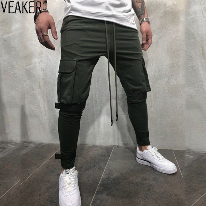 Satin Al 2018 Sonbahar Yeni Erkek Yuksek Sokak Sweatpants Pantolon Erkek Cok Cep Kargo Pantolon Kalem Pantolon Erkekler Duz Renk Esofman Alti 3xl Tl135 79 Dhgate Comda