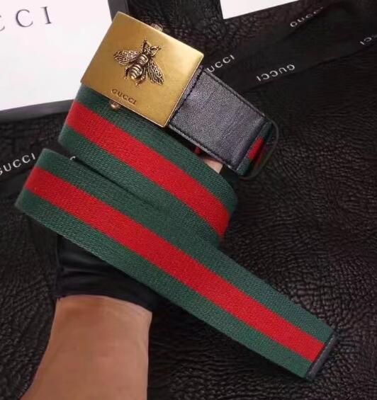 gucci tiger buckle web belt