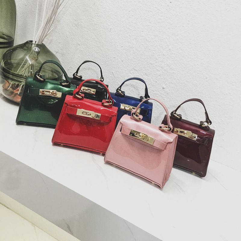 Compra Nuevo Caramelo De Color Jalea Bolso Para Niños Bolso De Charol De  Moda Bolsas De Mensajero Niños Niña Bolsos Para Bebés Bolsos Para Niños  Diseñador Monedero Infantil 582 Barato | Entrega
