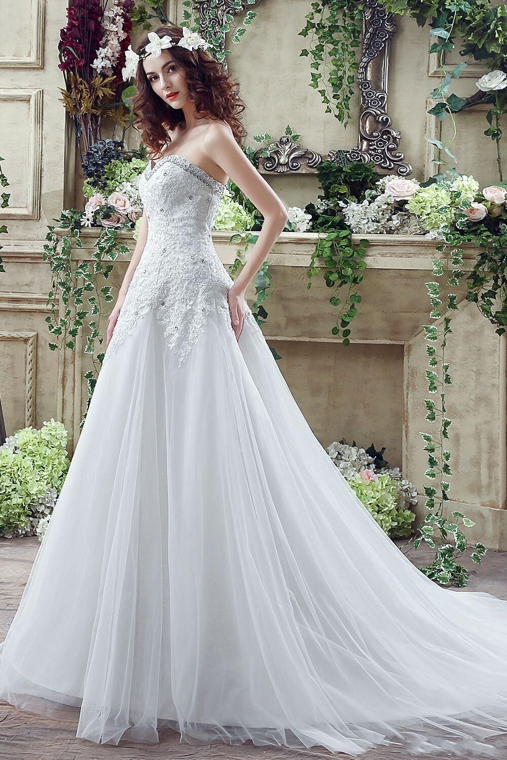 white corset under wedding dress