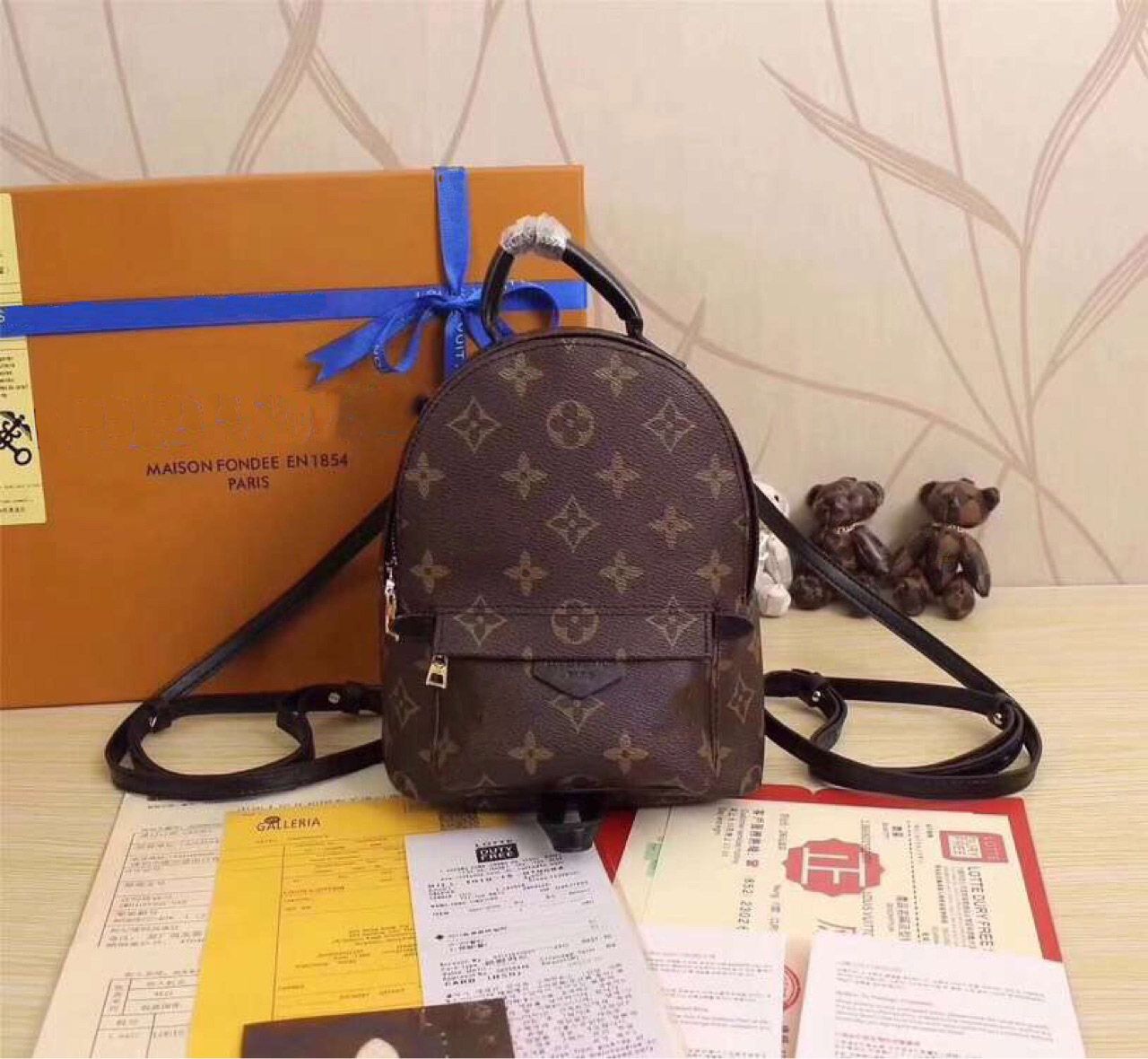 mini branded backpack