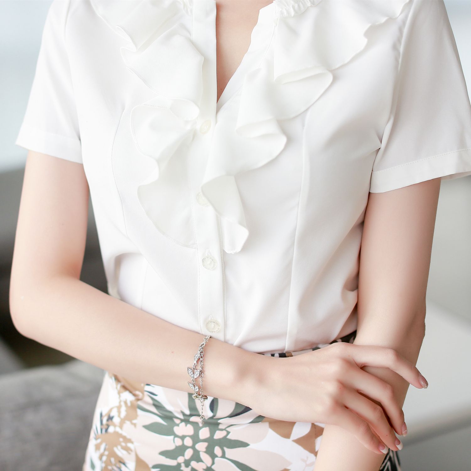 white v neck ruffle blouse