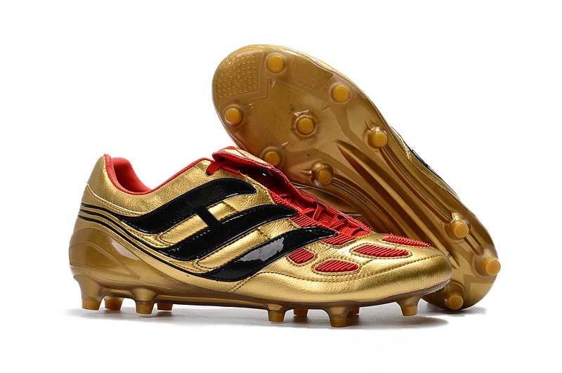 football cleats gold black