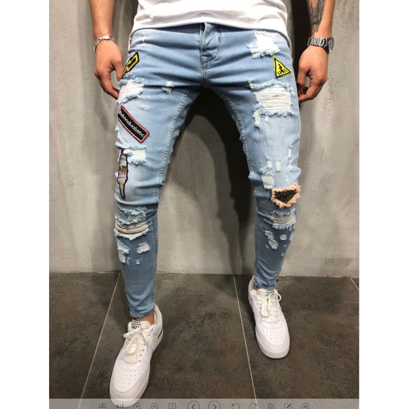 2018 Moda Hombre Jeans rasgados con parches Distressed Patchwork Hombre Streetwear Hiphop Insignia de